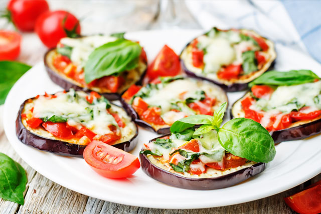 Vegetables tomato and avocado arranged in a plate to help them look tasty.