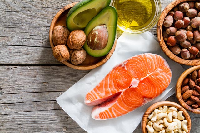 Fish, nuts, and seeds to represent foods in a diet that contain omega 3 and 6.
