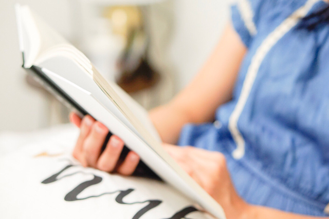 A person reading a book.
