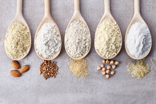 Image of spoons with different seeds in them.