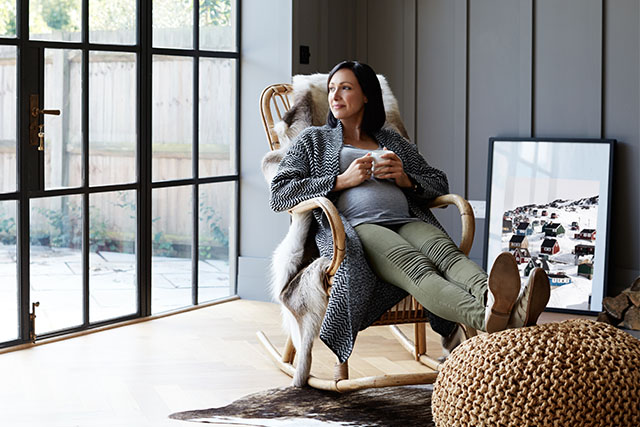 pregnant woman in rocking chair