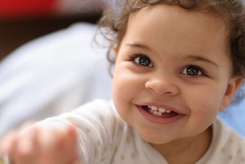 grinning toddler