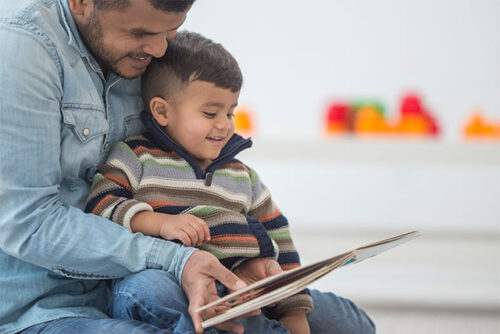 father and son reading
