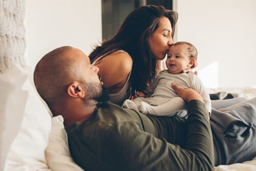 parents with their newborn