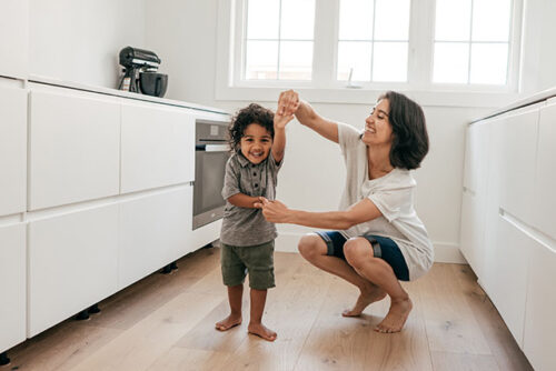 toddler and mom dancing