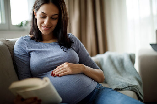 pregnant woman reading