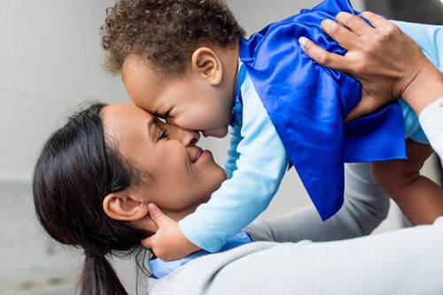 mom and toddler playing