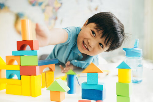 toddler playing with blocks