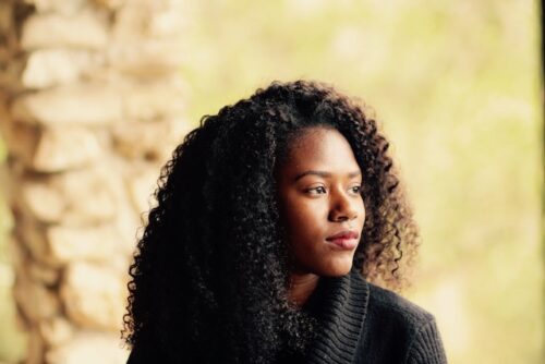 A woman looking off into the distance.