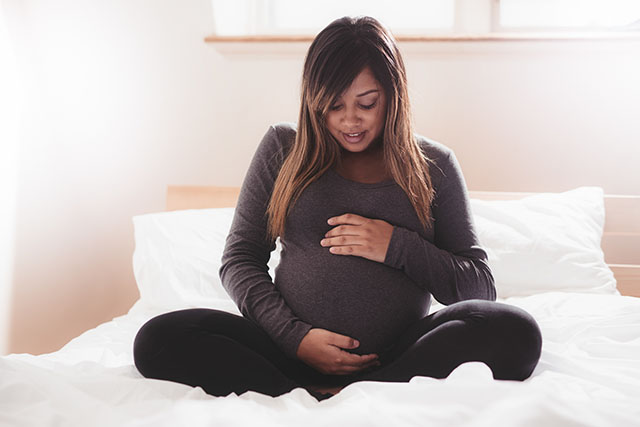 pregnant woman in bed
