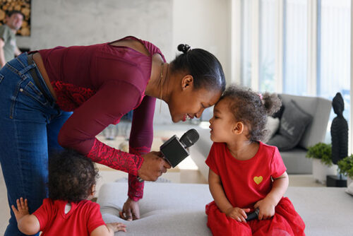 mom and toddler singing