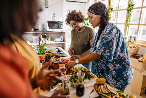 Image of a group of women cooking.