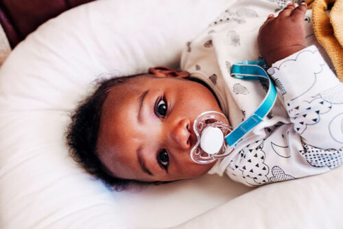 baby with pacifier