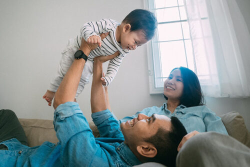 happy parents with baby