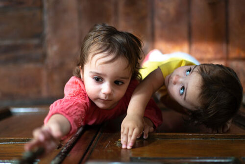 toddlers reaching for door