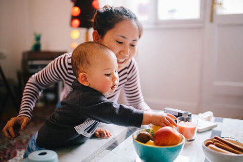 baby reaching for food