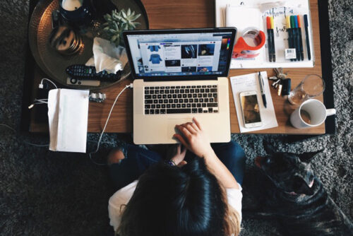 A person working from home on a laptop.
