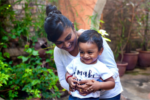 happy mom and toddler