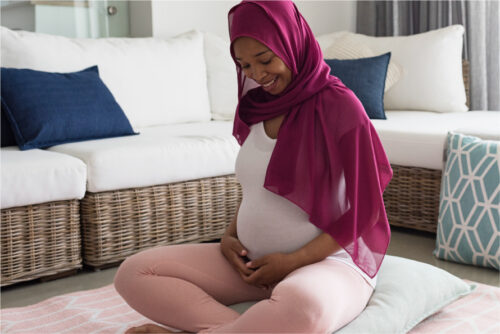 Woman meditating at home