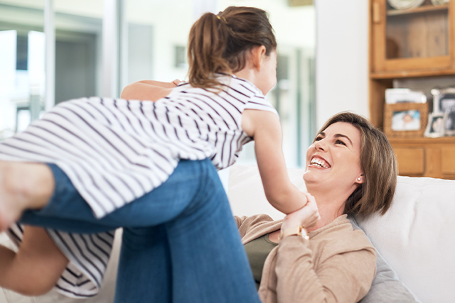 Mom playing with daughter