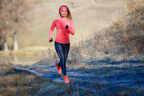 A person jogging during their cardio routine.