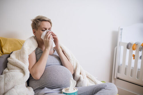 sick pregnant woman