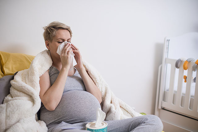 sick pregnant woman