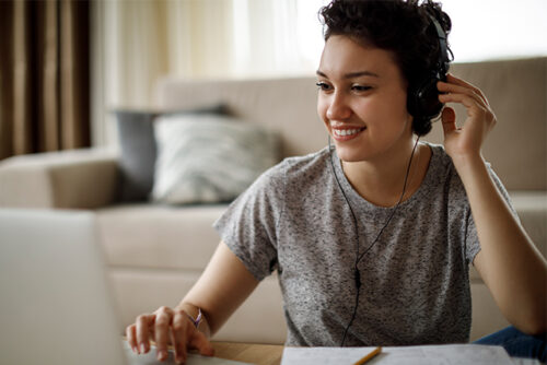 A women at computer reading about what she should've learned in sex ed class.