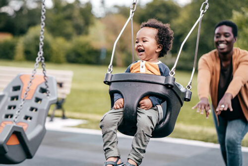 baby on swing set