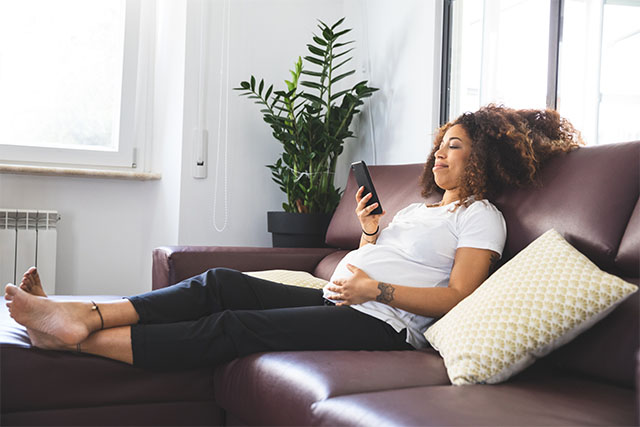 pregnant woman on couch