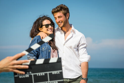 A couple smiling for a picture.