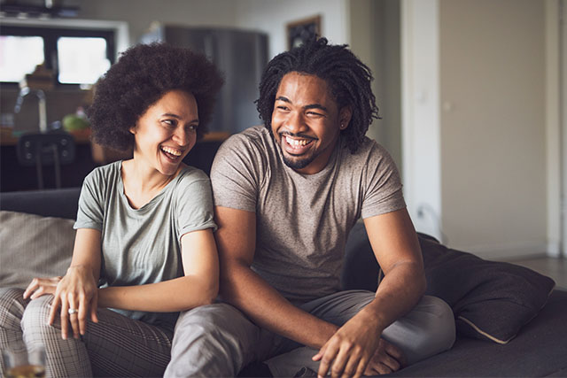 A smiling couple.