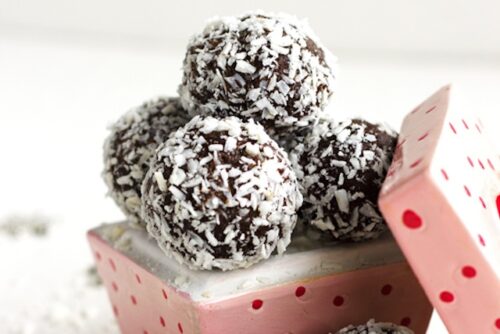 A container of healthy truffle balls from the article's recipe.