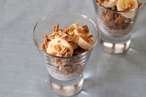 Two cups of almond butter granola from a recipe.
