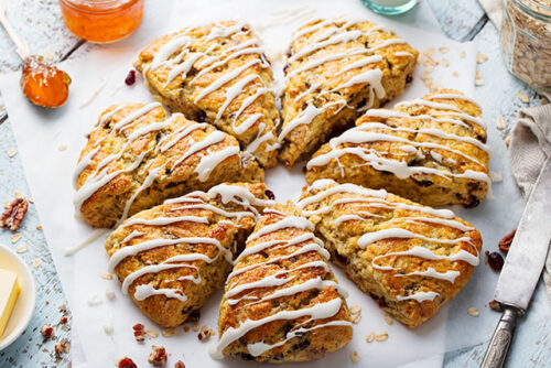 A plate of cranberry orange scones from the article recipe.