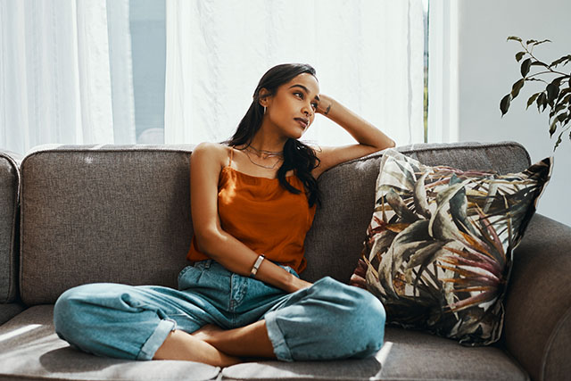 A person sitting on couch.