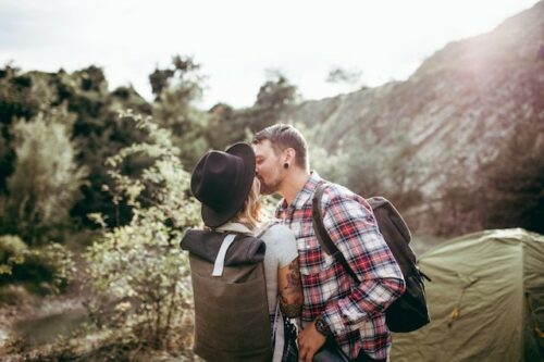 Two people kissing.