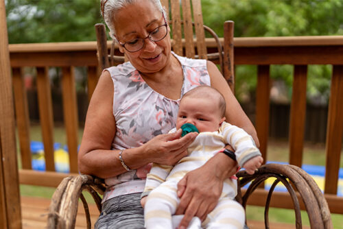 person holding baby