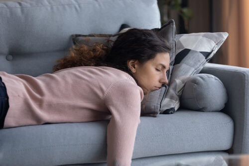woman asleep on the couch