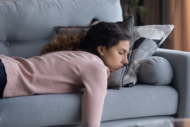 woman asleep on the couch