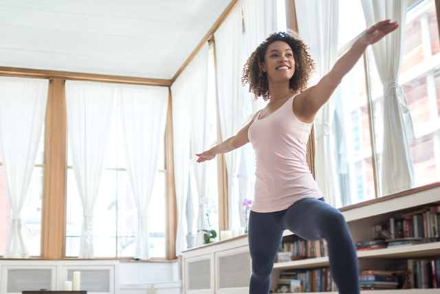 woman practices yoga