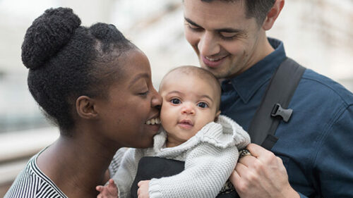 Family with baby in carrier