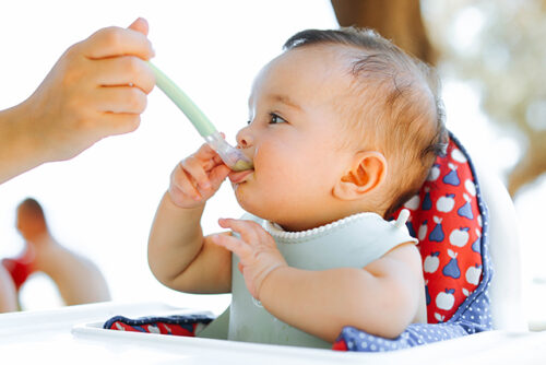 Baby eats from a spoon