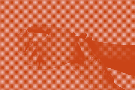 faded image of a woman holding her wrist