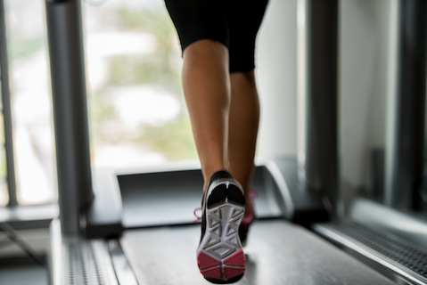 woman running on a treadmill